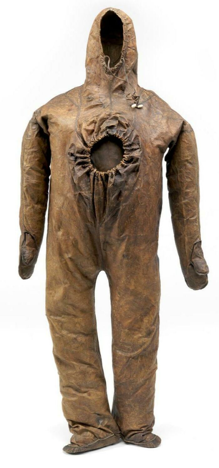 Ancient artefact of a full-body leather suit with a hood, possibly for protection, remarkably preserved.