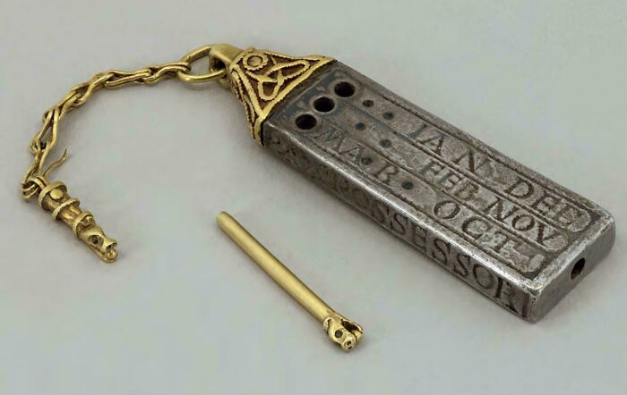 Ancient artefact, intricately designed calendar tool with gold detailing, showcasing remarkable preservation.