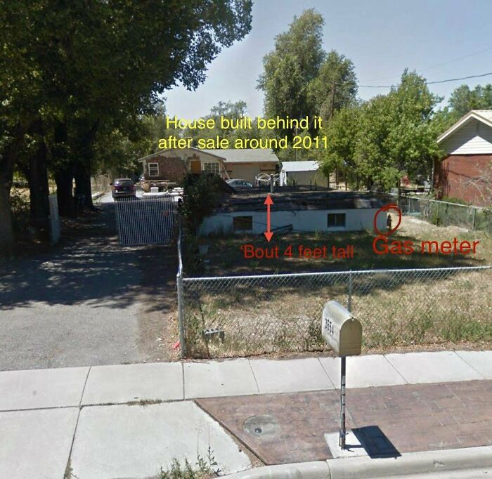 Weird object in front yard resembling a low structure with text annotations about nearby house and gas meter.