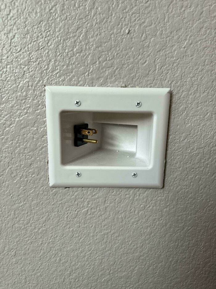 Weird object: recessed outlet on a wall.
