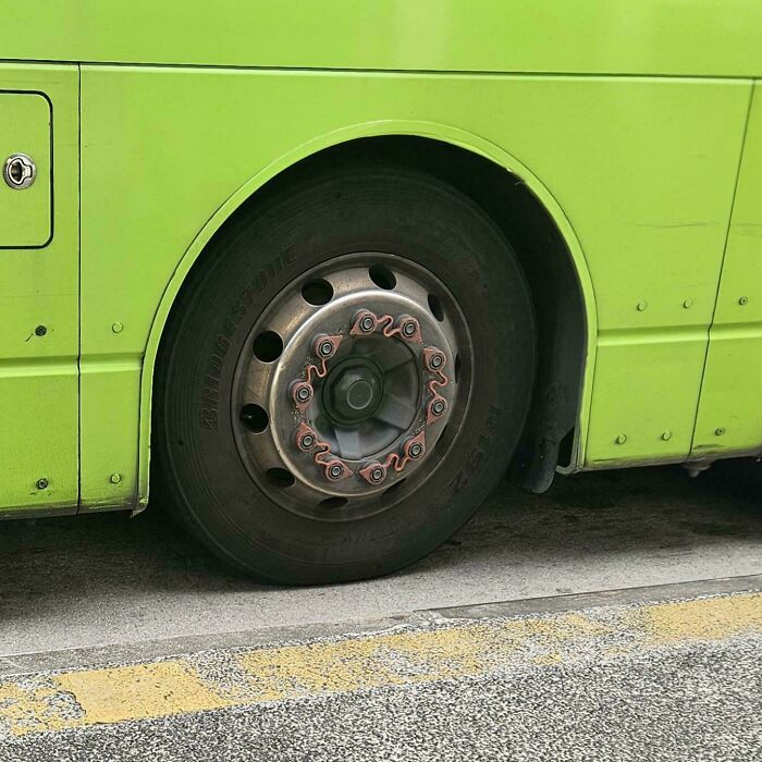 Bus wheel with unusual design, part of quirky and weird objects found by people.