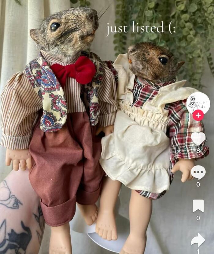 Two DIY taxidermy squirrel dolls dressed in vintage clothing.