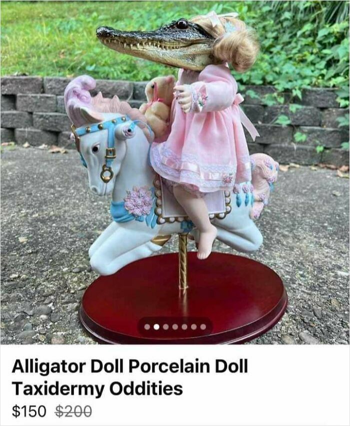 DIY project featuring a doll on a horse with an alligator head, part of a taxidermy oddity collection.