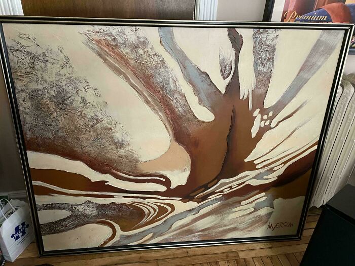 Abstract art painting with earthy tones, a dumpster diving treasure that would wow neighborhood raccoons.