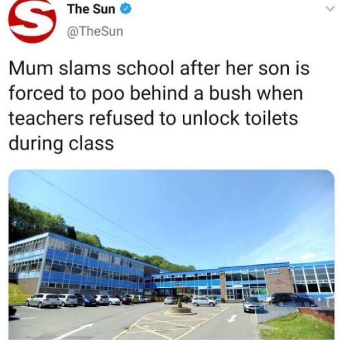 School building exterior under a clear sky, related to infuriating teachers refusing bathroom access.