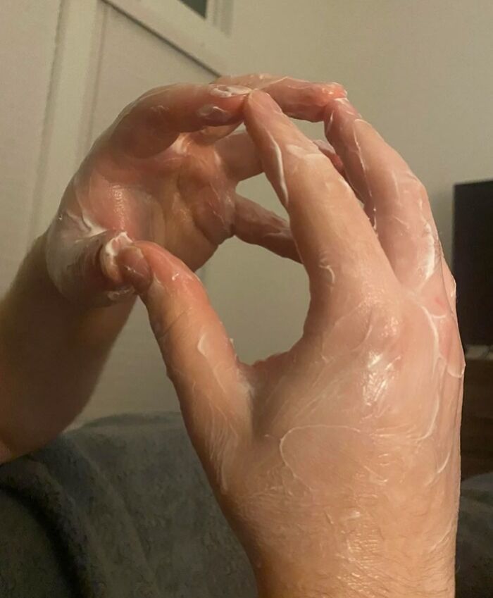 Hands covered in lotion, illustrating a playful gesture common among annoying boyfriends and husbands.