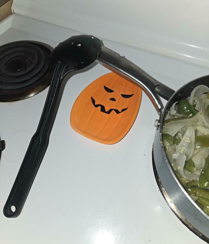 Cooking prank with ladle teetering on pot, illustrating annoying boyfriends or husbands' antics in the kitchen.