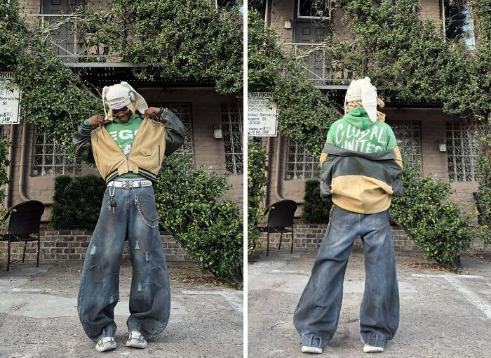 Person taking a fashion risk with oversized jeans and layered jackets, showcasing creativity and confidence.