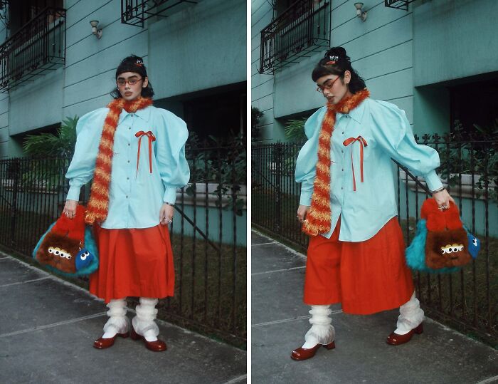 A person showcasing bold fashion risks with a colorful outfit and unique accessories, standing outside a building.