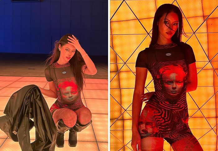 Person posing in bold fashion with a graphic dress against a vibrant geometric backdrop, showcasing fashion risks nailed.