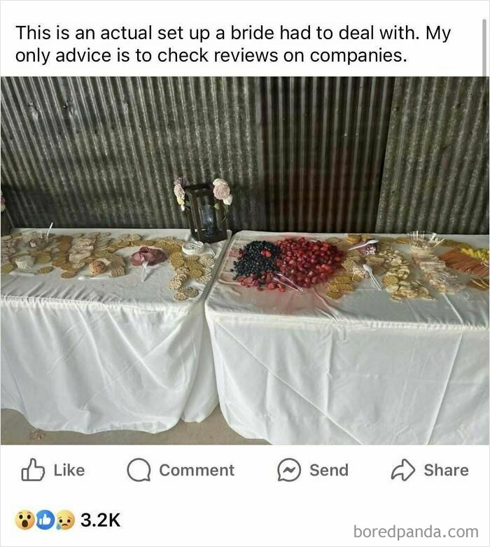 Budget wedding fails with poorly arranged food tables covered in white cloths.