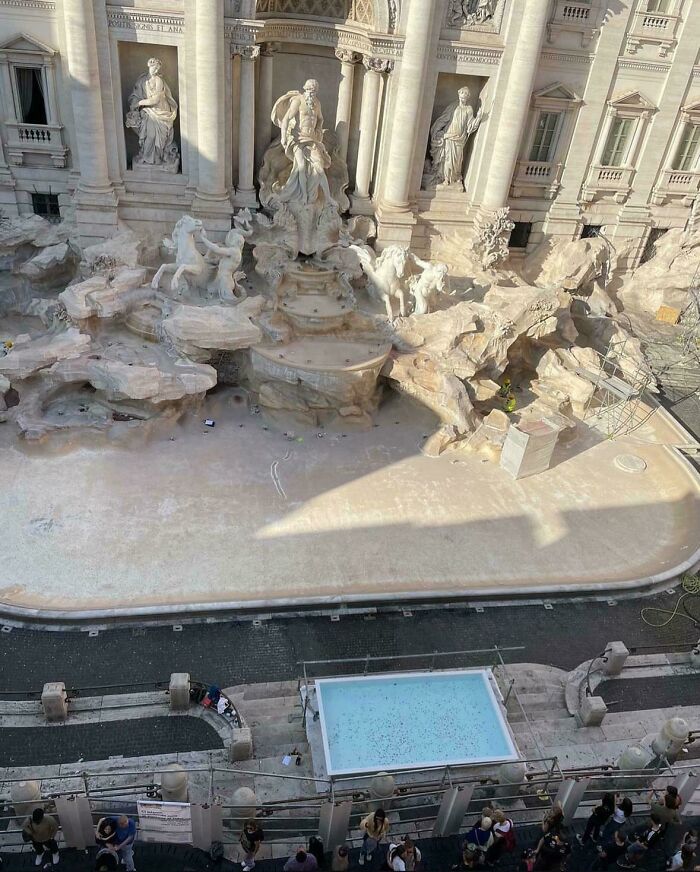 Trevi Fountain undergoing maintenance, a unique tourist interesting experience for visitors in Rome.