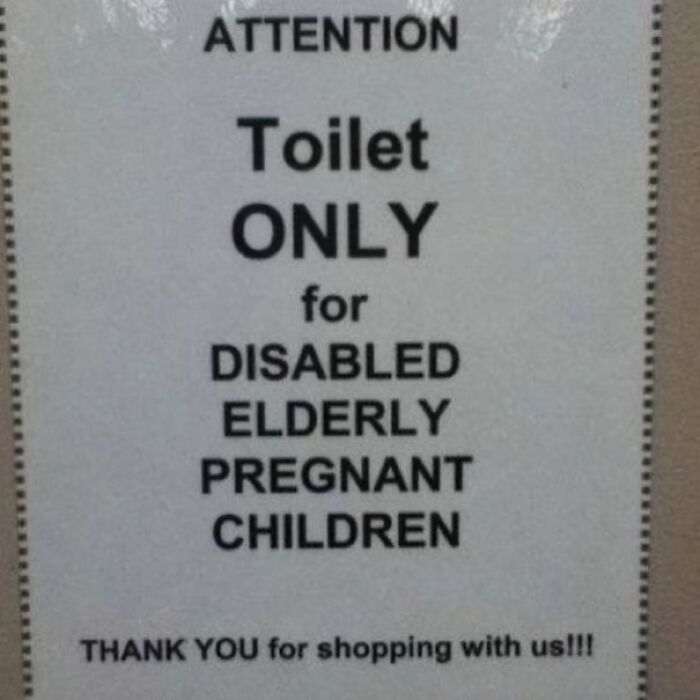 Sign for a toilet with odd wording, highlighting a design fail.