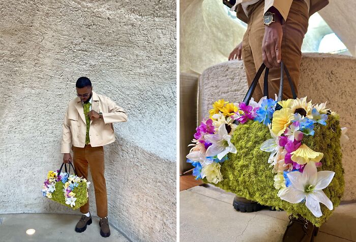 Person in a beige jacket and brown pants, showcasing a bold fashion look with a floral, moss-covered bag.