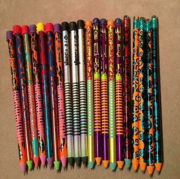 Colorful '90s pencils lined up, showcasing vibrant designs and nostalgic patterns.