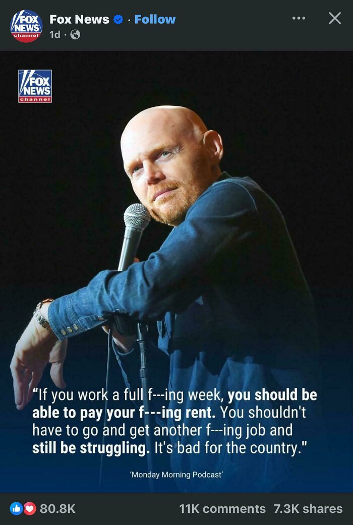 Comedian on stage, gesturing with a microphone, discussing social issues.