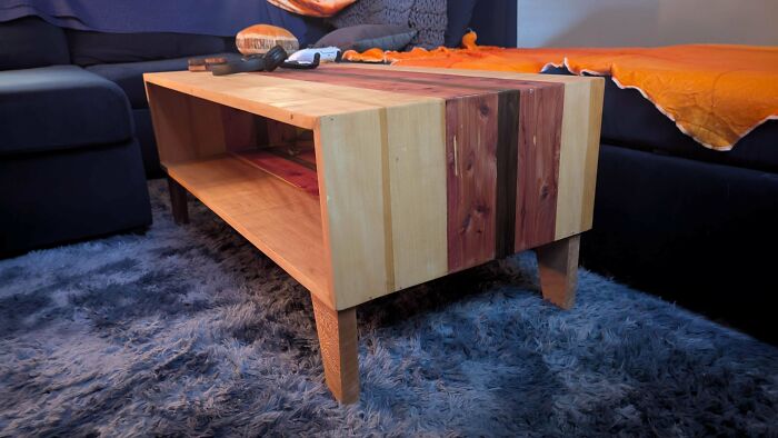 Handcrafted wooden coffee table with natural wood grain, showcasing woodworking skills and creative woodworker projects.