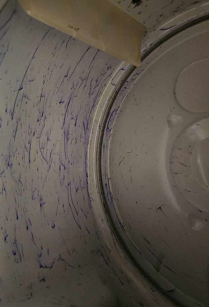 Ink-stained washing machine drum, a common issue caused by annoying boyfriends and husbands leaving pens in clothes.