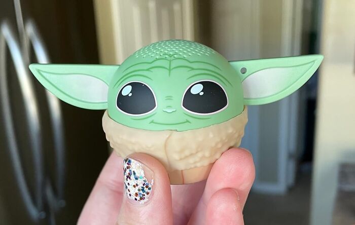 Cute toy of green character with big eyes, perfect gift option for the fun aunt or uncle.