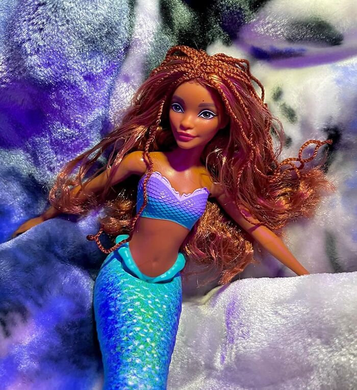 Mermaid doll with long braided hair, wearing a purple and turquoise outfit, perfect gift for the fun aunt or uncle.