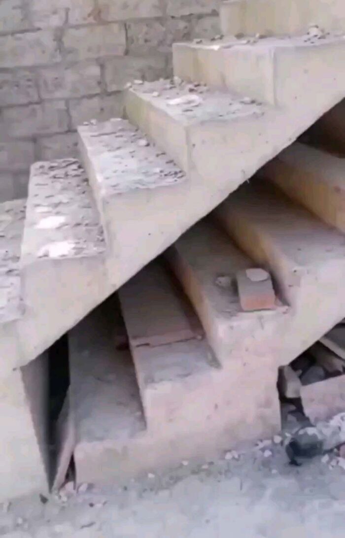 Concrete staircase with a design error, showcasing an architecture fail.