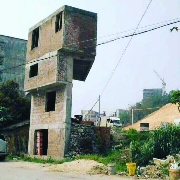 Unstable brick structure with poor design showcases major architecture fails in an urban setting.