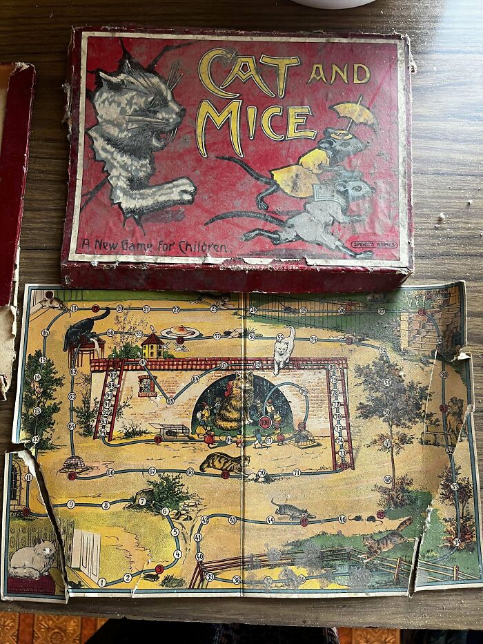 Vintage toy board game "Cat and Mice" with intricate path design, evoking childhood nostalgia.