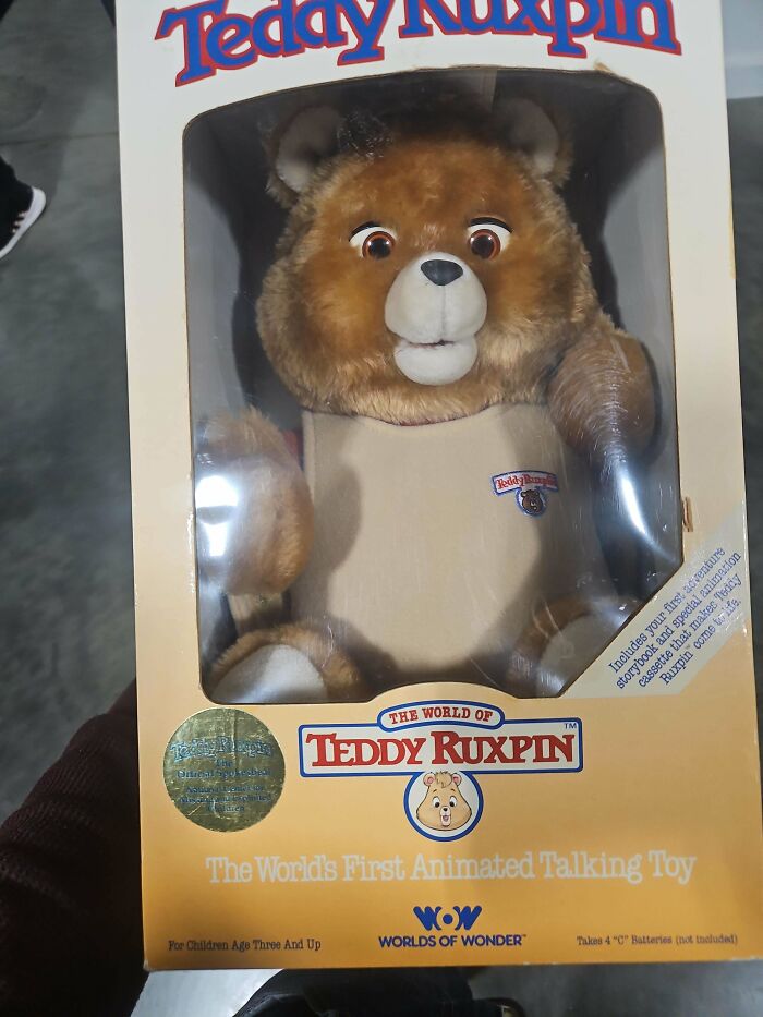 Vintage Teddy Ruxpin toy in original box, representing nostalgic childhood memories.