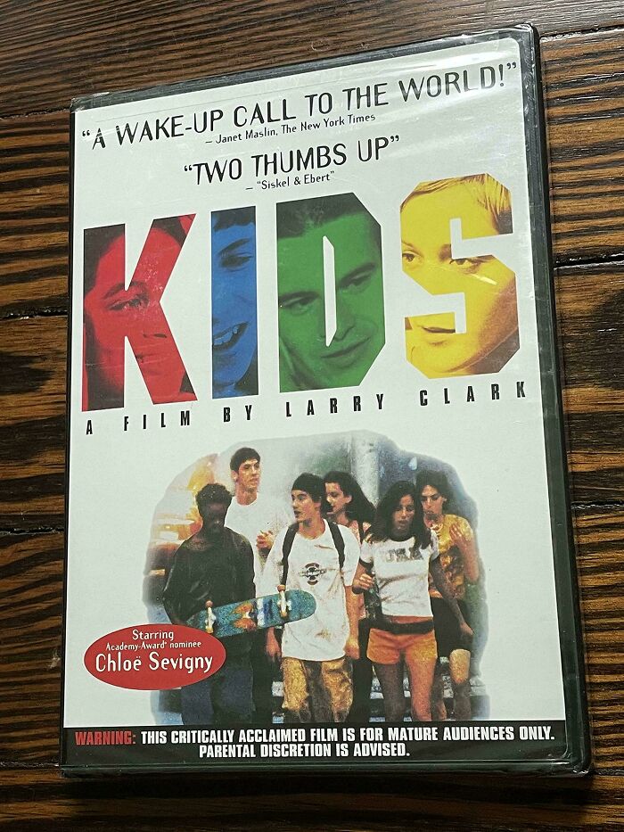 DVD cover of the '90s film "Kids" with a group of teenagers, skateboard, and bold colorful letters.