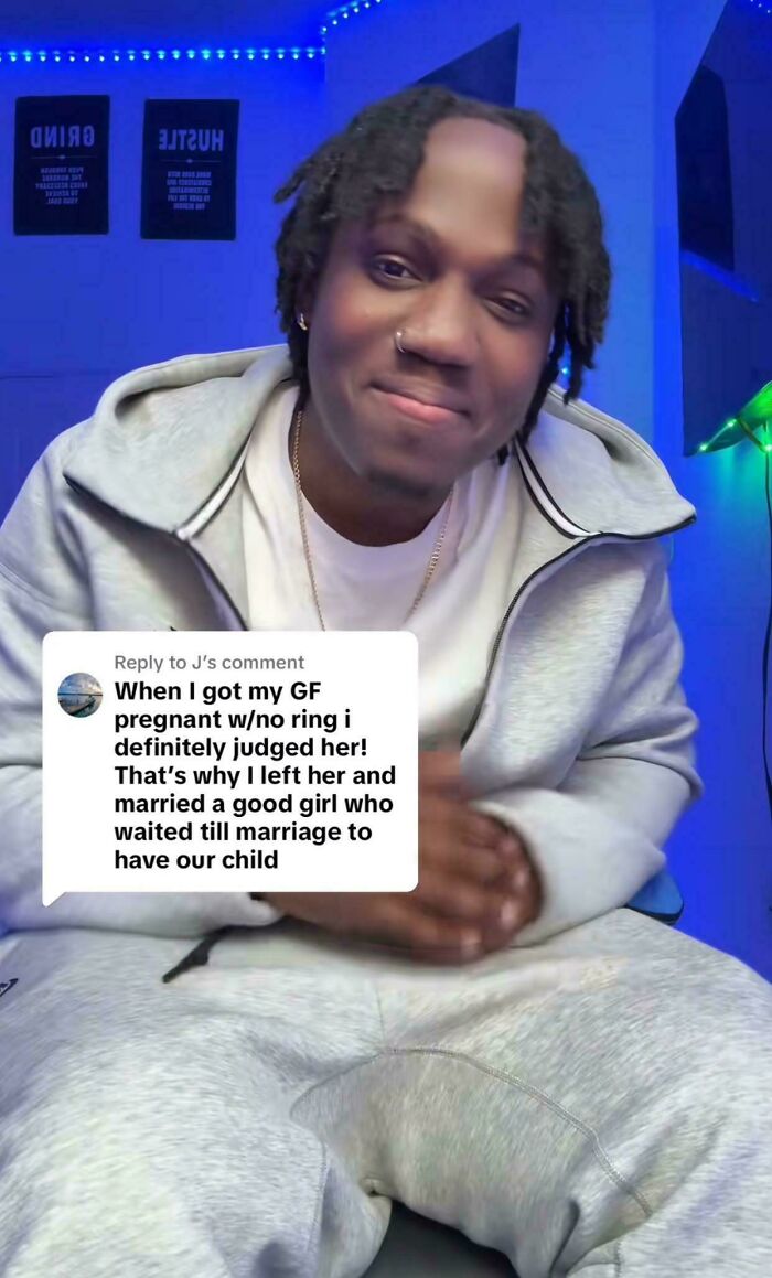 Man in a cozy room with neon lights and controversial statement on relationships displayed alongside.