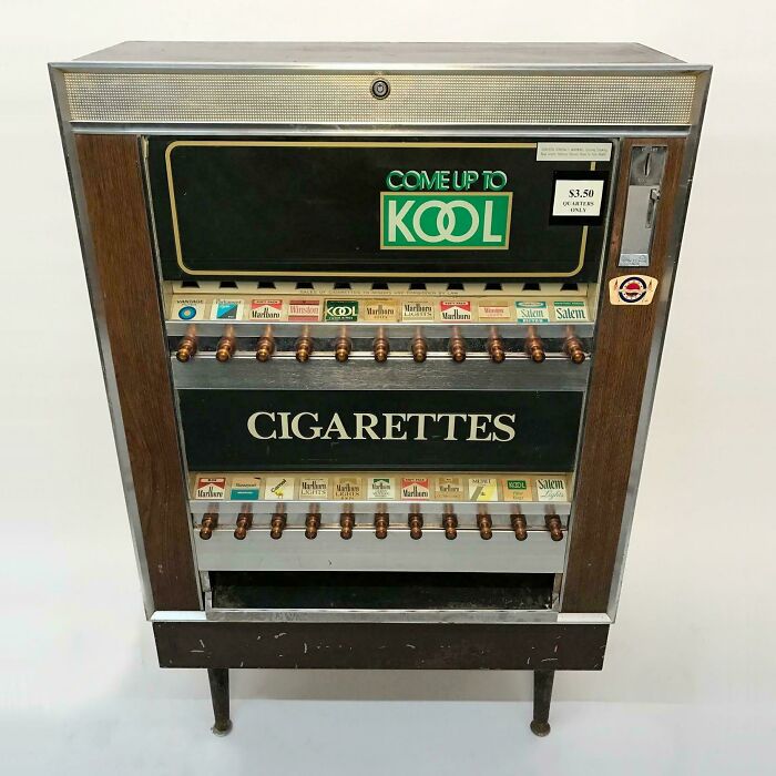 Retro cigarette vending machine with KOOL branding, showcasing nostalgic design elements that make you feel old.