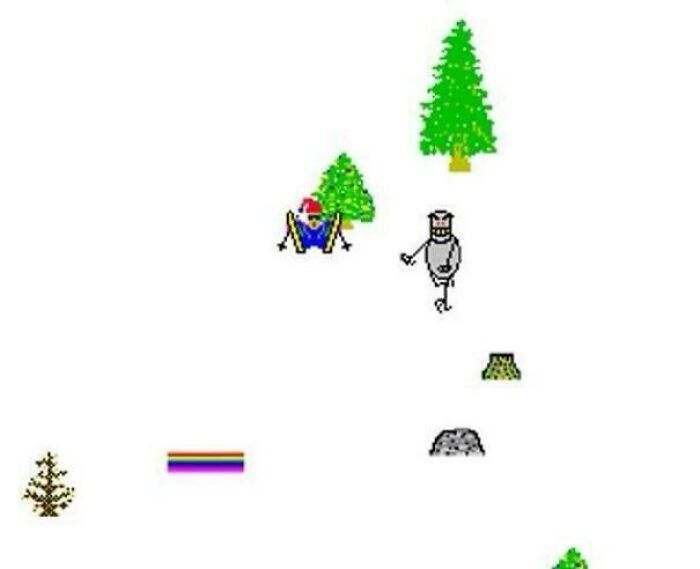 '90s skiing game with a skier, trees, and obstacles on a snowy landscape, reminiscent of retro video game graphics.