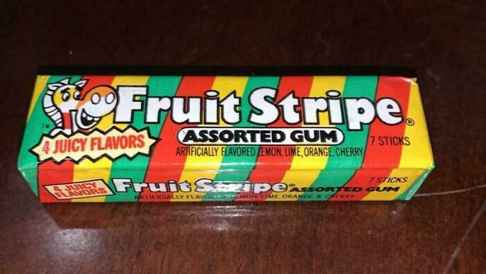 Fruit Stripe gum pack with colorful stripes and zebra mascot, sparking nostalgic feelings of childhood.