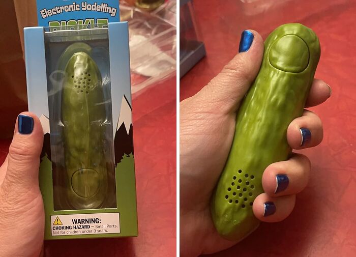 Hands holding an Archie McPhee item, an electronic yodeling pickle in packaging.