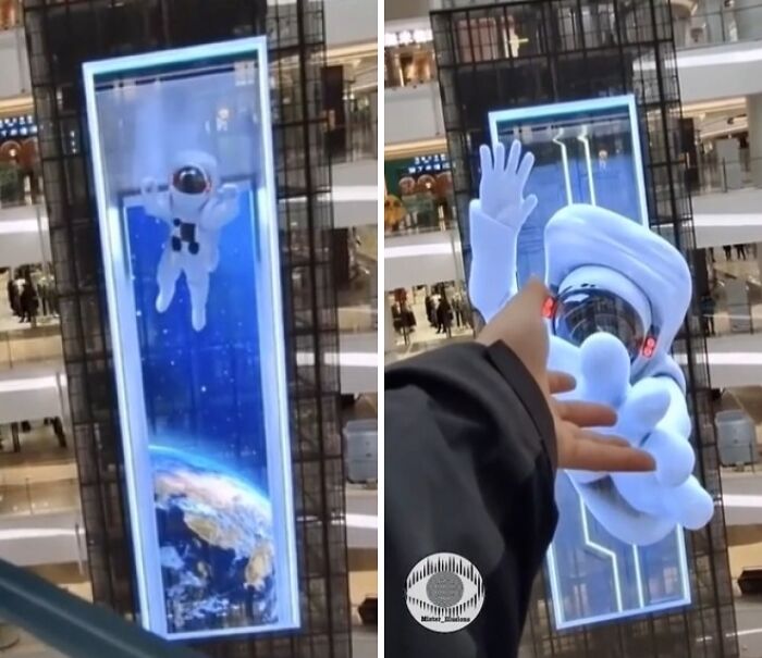 Astronaut 3D display in a shopping mall offering tourist interesting experiences with interactive visuals.