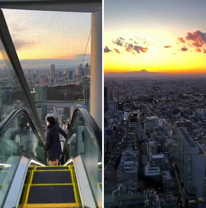 Escalator overlooking city skyline at sunset, showcasing tourist-interesting experiences.