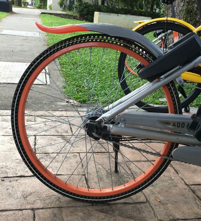 Bicycle with an airless tire parked on a path, offering a unique tourist-interesting experience.