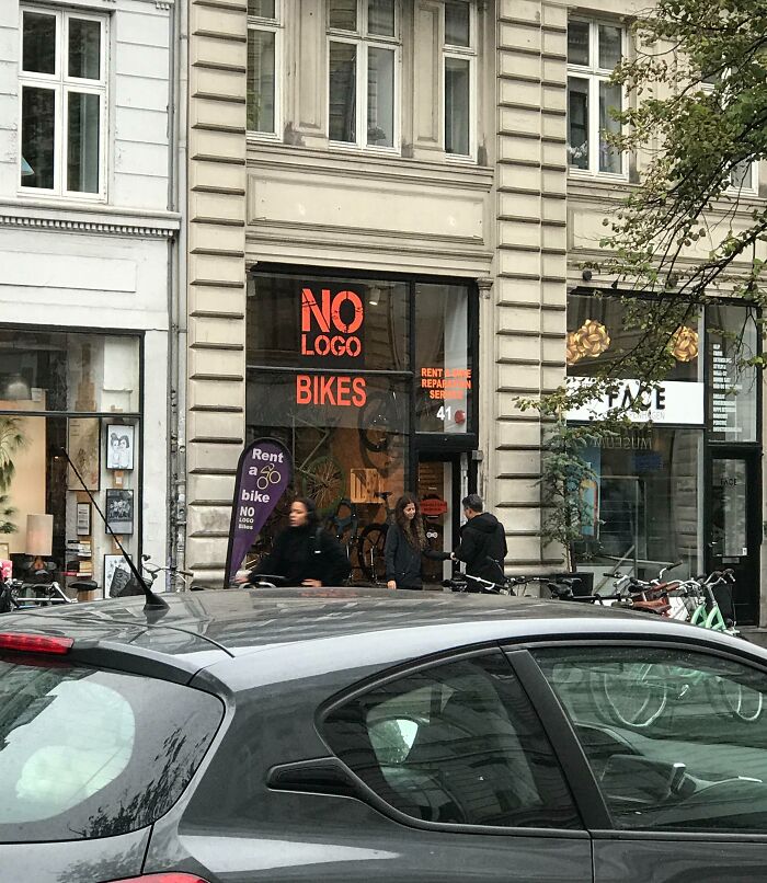 Bicycle rental shop in an urban area, attracting tourists with interesting experiences.