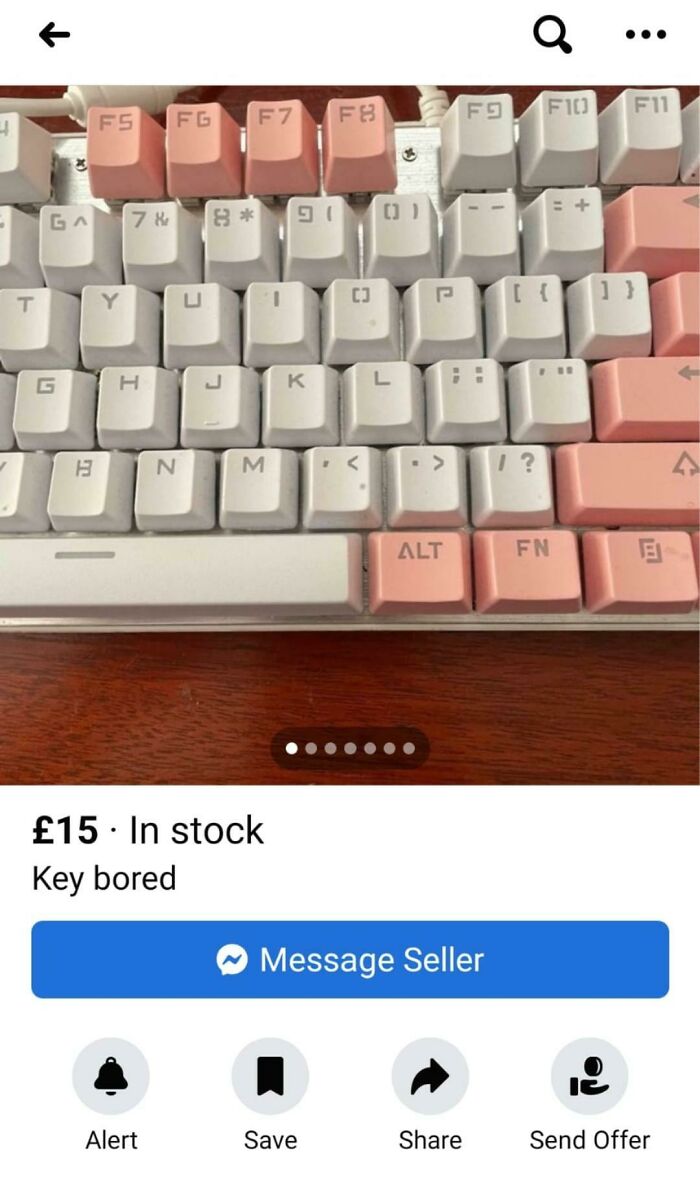 Keyboard listing with misspelled title "Key bored," featuring pink and white keys, priced at £15.