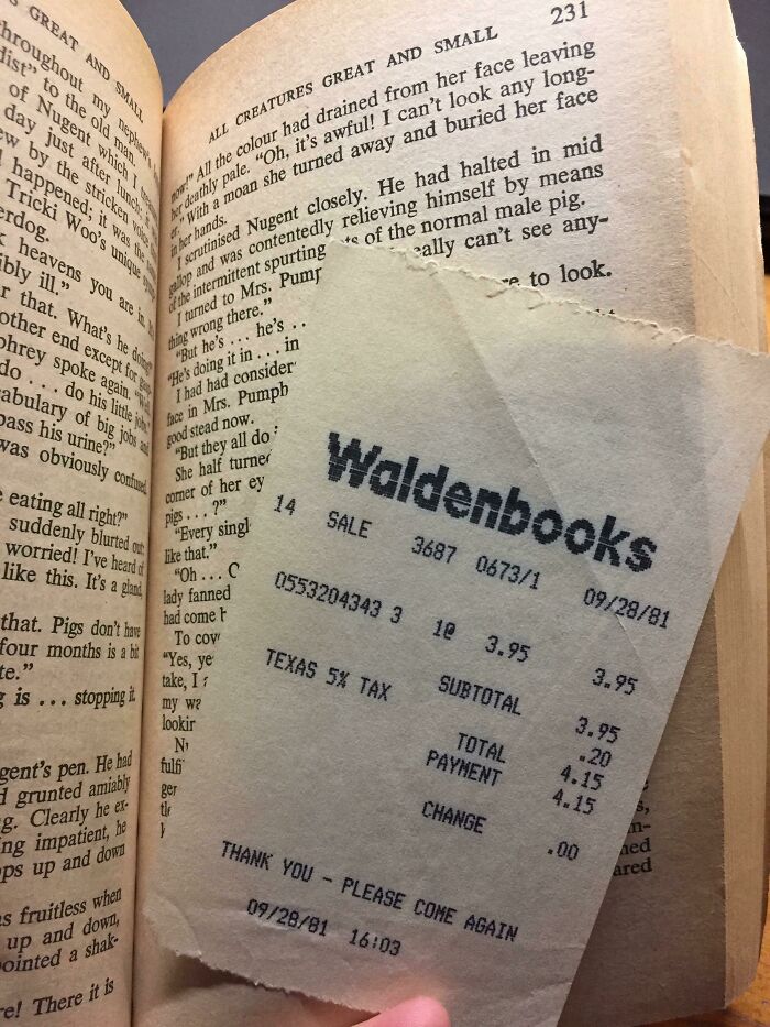 Old interesting receipt from Waldenbooks found inside an open book, dated 09/28/81, showing purchase details.