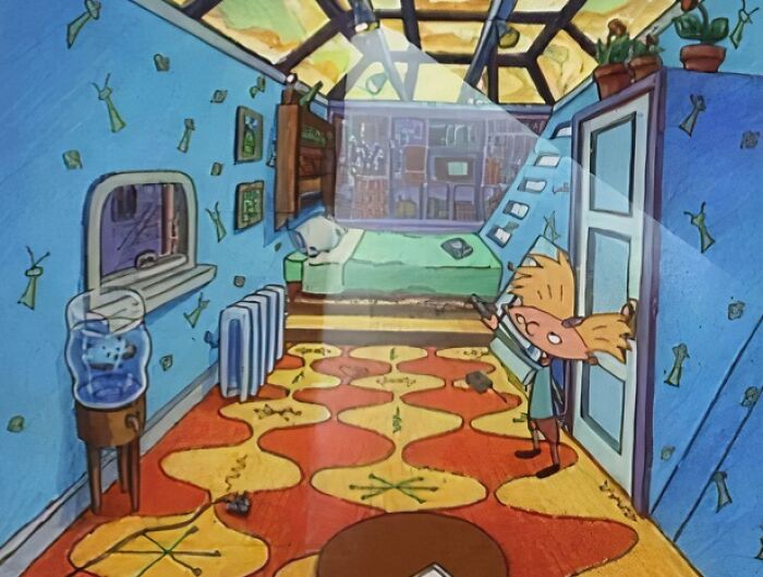 Cartoon character from the wild ’90s in a colorful, quirky room with a zigzag carpet and skylight, reminiscent of the era.