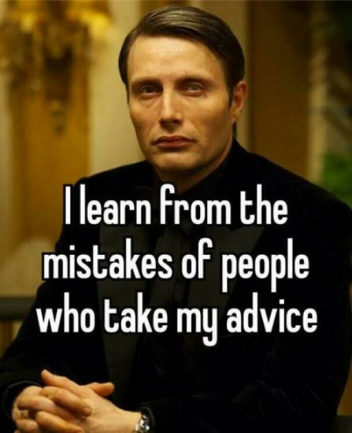 Man in a suit with witty text about advice and mistakes, capturing a funny meme for entertainment.
