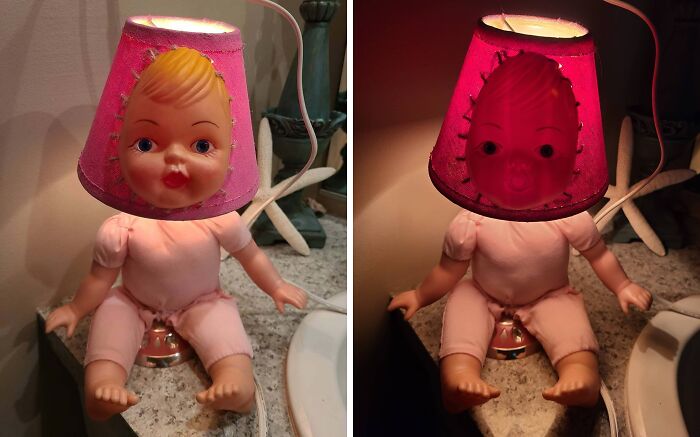 Creepy handmade craft: doll-shaped lamp with pink lampshade, providing an eerie ambiance on a bathroom countertop.