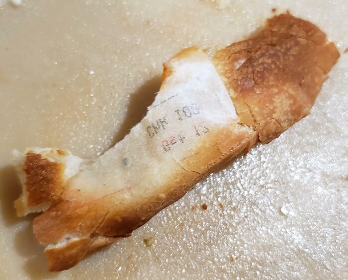 A receipt printed on a piece of bread, showcasing unique and interesting receipt finds.