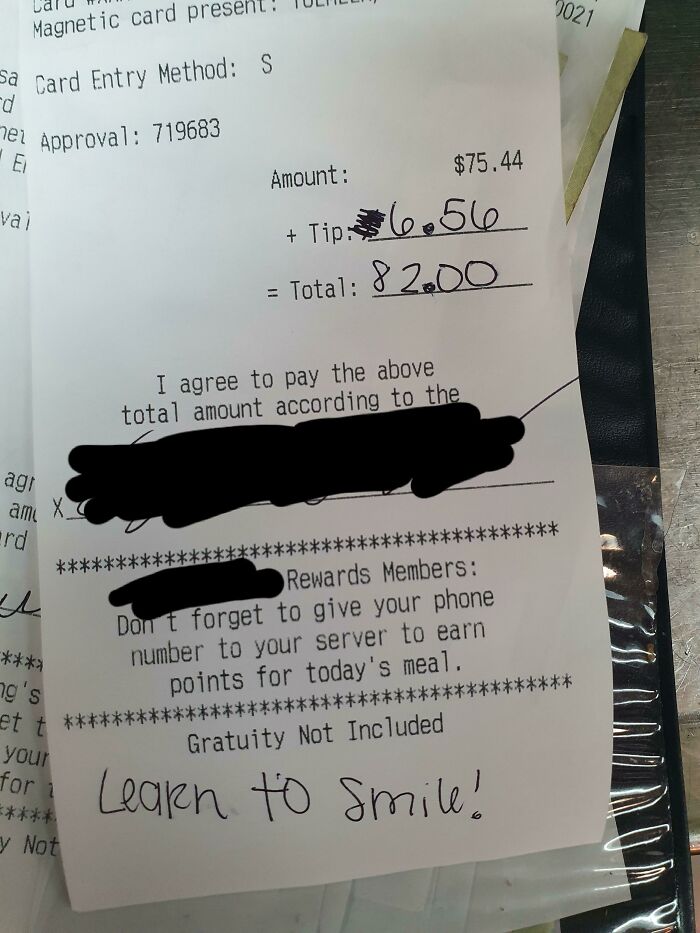 Receipt showing server tips with handwritten note saying, "Learn to smile!"