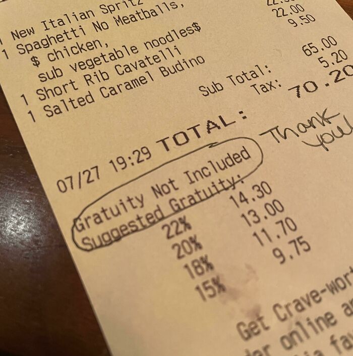 Restaurant receipt showing "Gratuity Not Included" with suggested tips, highlighting mildly infuriating server tips.