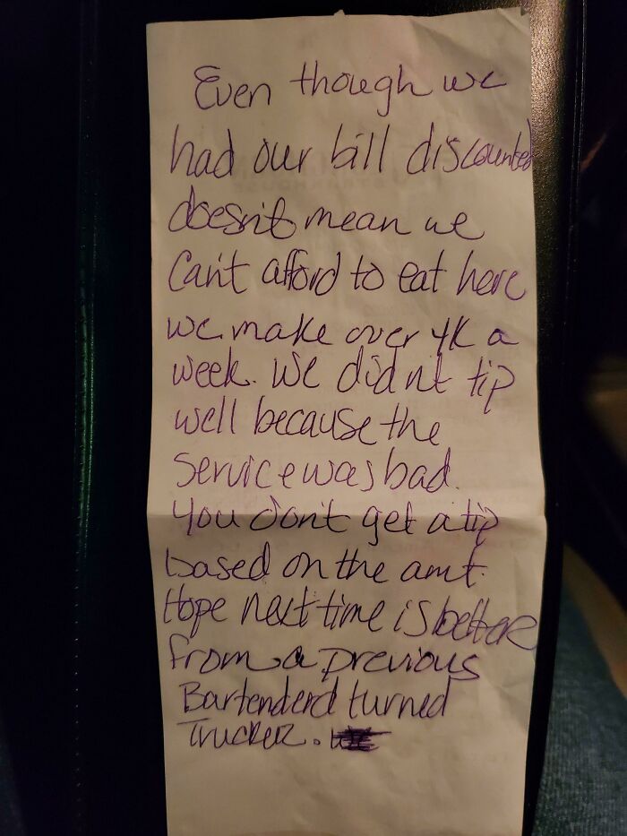 Handwritten note criticizing service and explaining a reduced tip, related to mildly infuriating server tips.