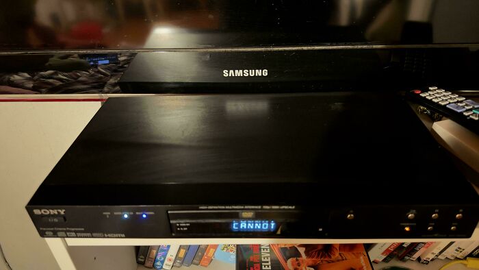 A Sony DVD player under a Samsung TV with a remote, representing durable, Buy It For Life purchases.