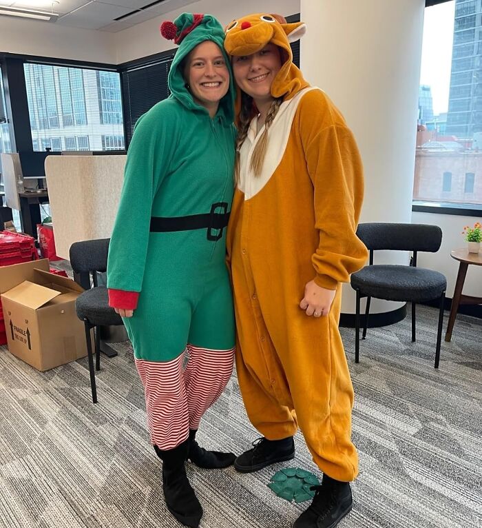 Two people in festive costumes, representing impulse buys in a cheerful office setting.