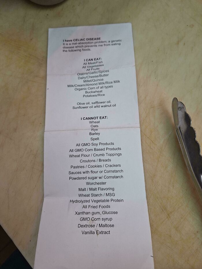 Celiac disease food list on a table, detailing what can and cannot be eaten in food service industry settings.